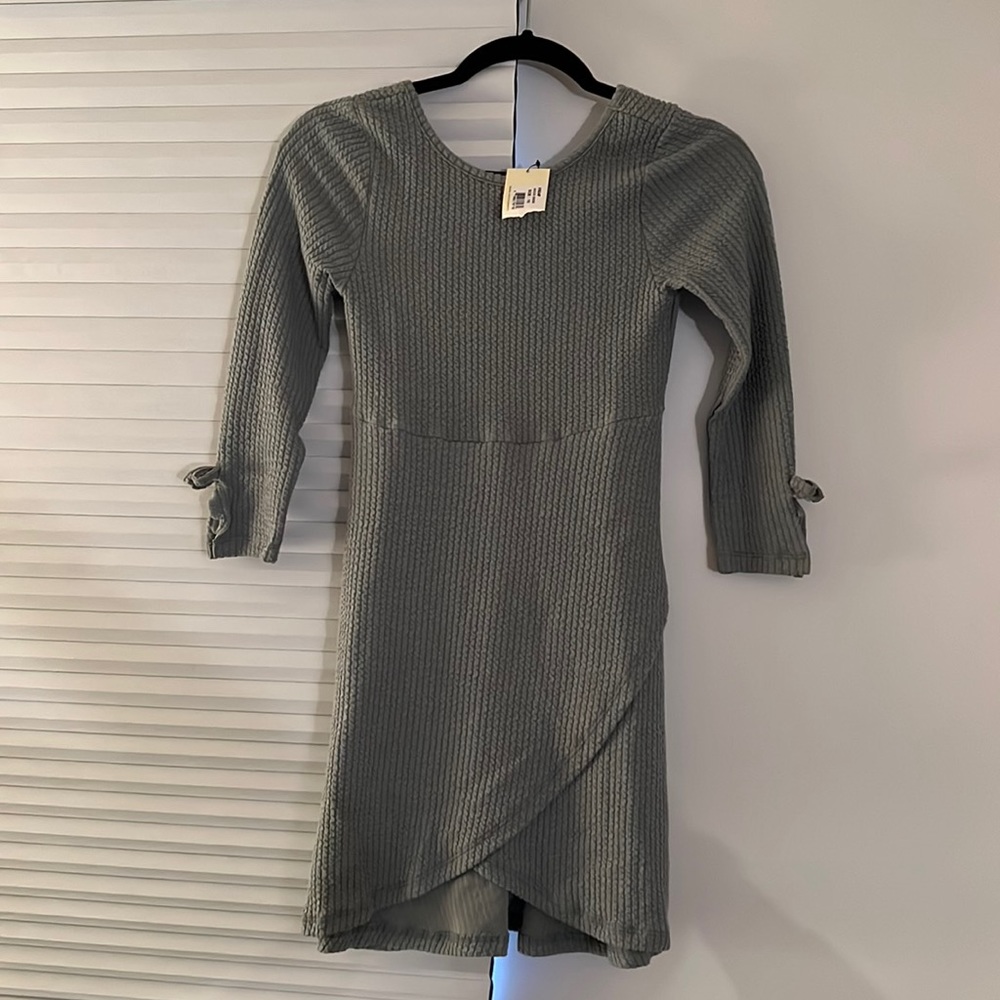 Girls ruffle dress. Never worn.